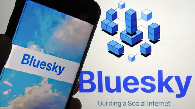 The BlueSky logo on a phone. | The Copyright Richard Drew/Copyright 2023 The AP. All rights reserved